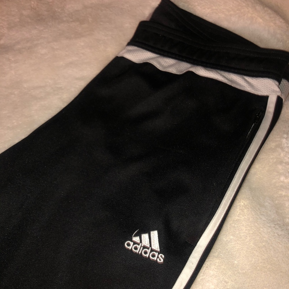 Woman’s Adidas track pants